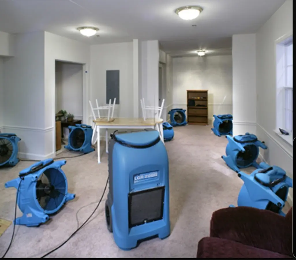 Air movers and dehumidifier setup for Water Damage Restoration in Montgomery